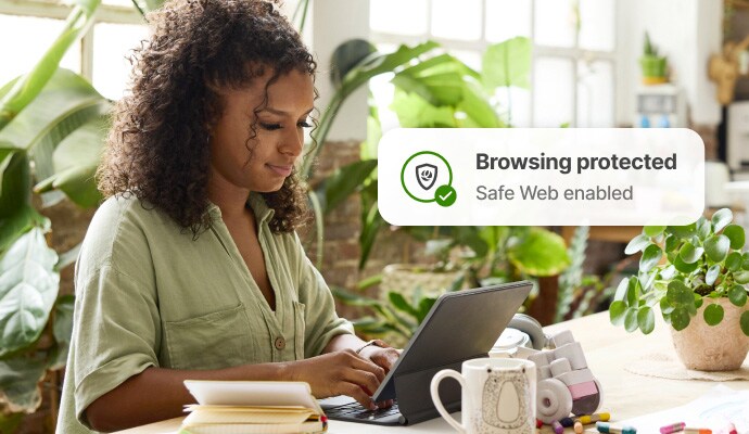 Internet browsing protection - a woman checking her email on her laptop